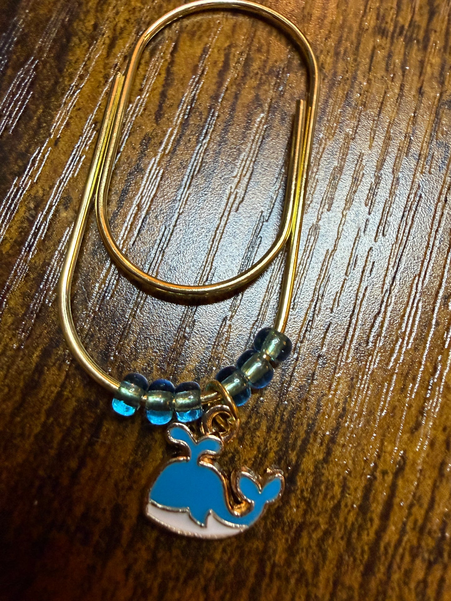 2 inch gold paper clip with beads and blue whale