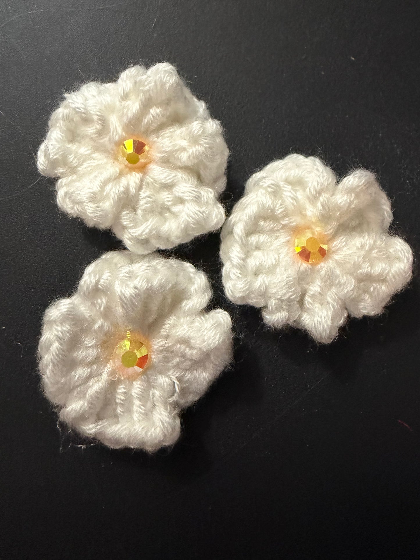 White flowers with yellow center
